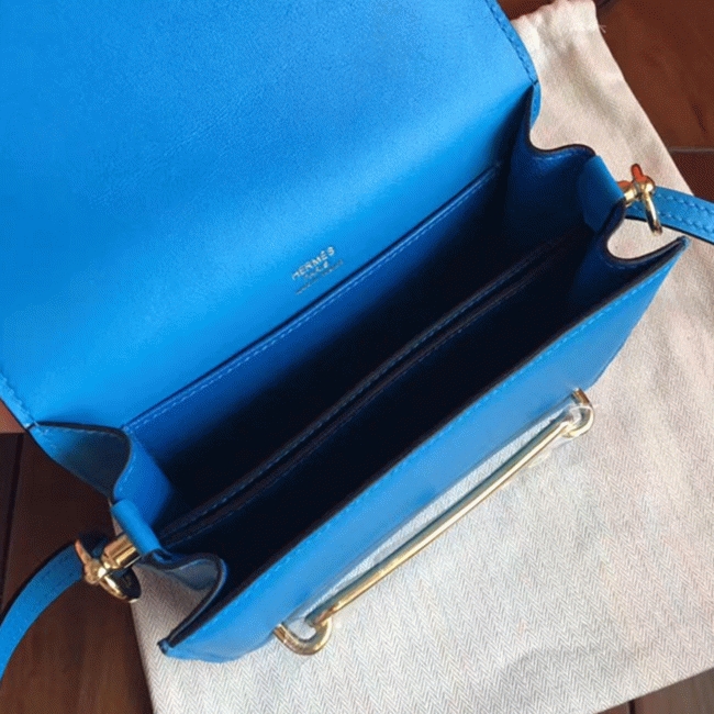 Blue hydra luxury replica Hermes Mini Sac Roulis handbag angle 2