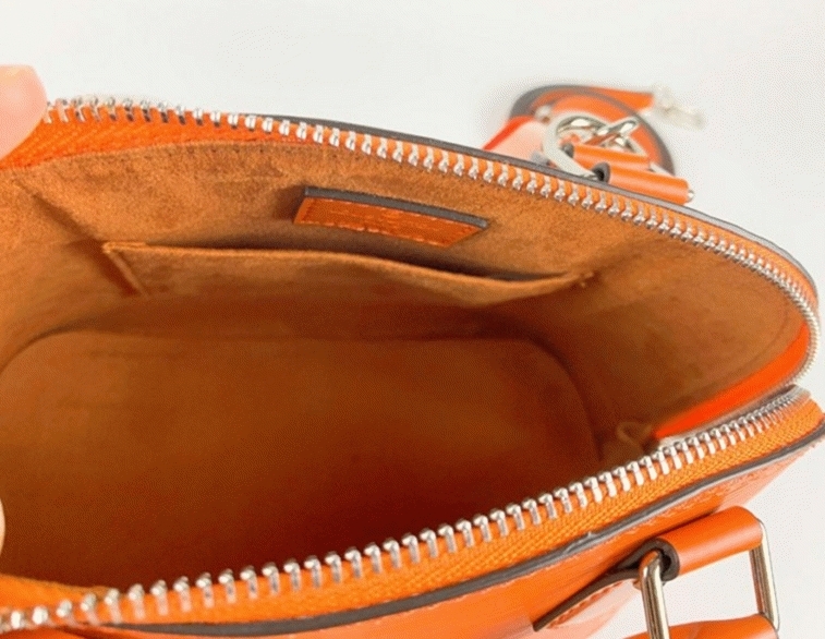 Louis Vuitton Epi Leather Alma BB Handbag In Orange With Jacquard Strap angle 4