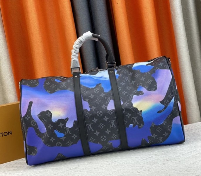 Louis Vuitton Monogram Eclipse Keepall 55 Bandouliere Travel Bag In Blue Sunrise angle 2