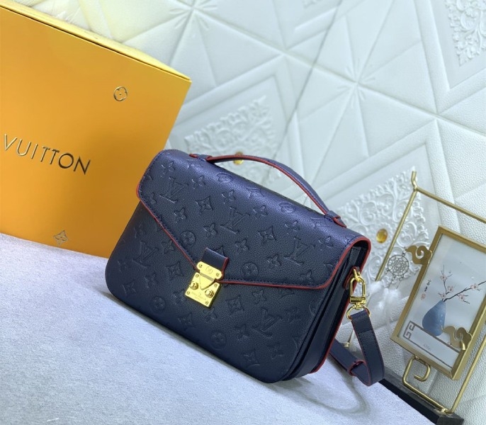 LV Monogram Empreinte Leather Metis In Navy Blue And Red angle 2