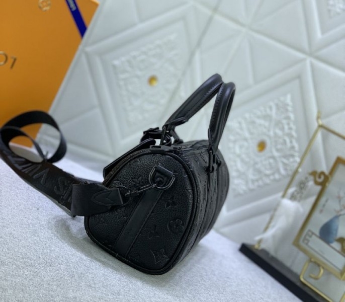 Louis Vuitton Taurillon Monogram Leather Keepall Bandouliere 25 In Black angle 4