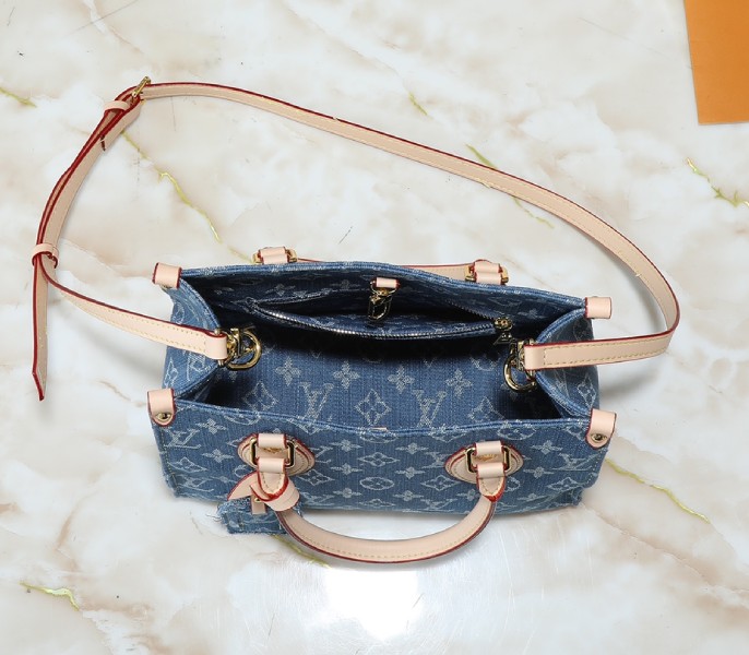 Monogram Denim OnTheGo PM In Blue angle 3