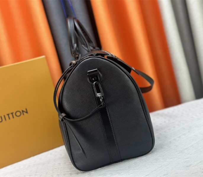 Louis Vuitton Taiga Leather Keepall Bandouliere 45 In Black And Monogram Macassar Canvas angle 4