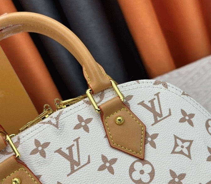 Louis Vuitton Monogram Dune Canvas Alma BB Bag angle 2