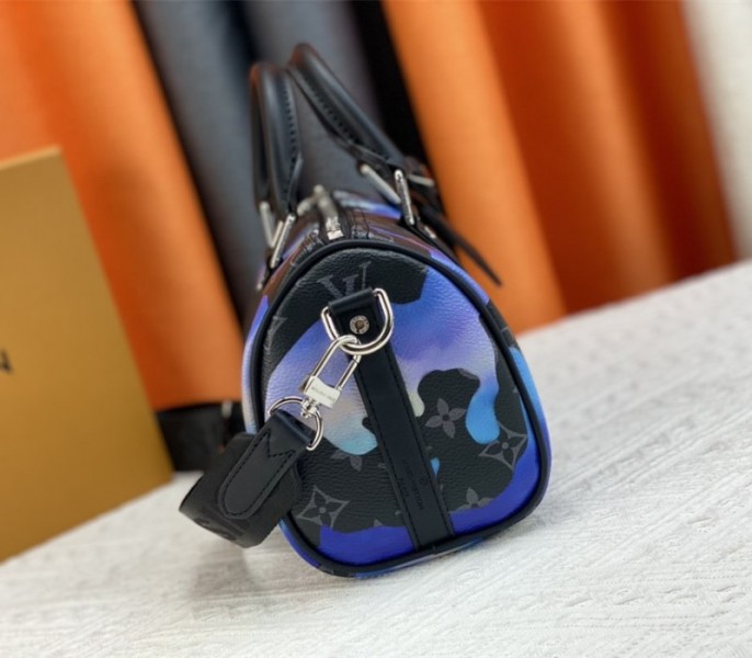 Louis Vuitton Monogram Eclipse Keepall Bandouliere 25 Travel Bag In Blue And Purple Sunrise angle 3