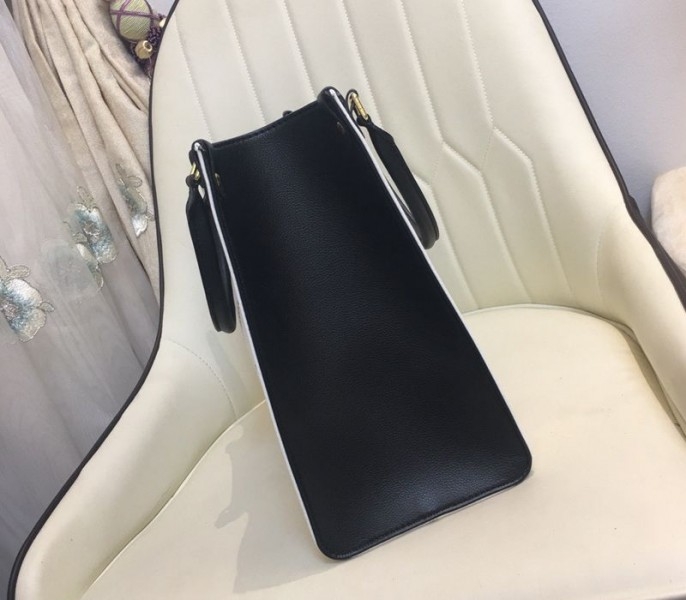 Louis Vuitton Spring 2022 Monogram Empreinte Onthego MM Tote In Cream angle 5