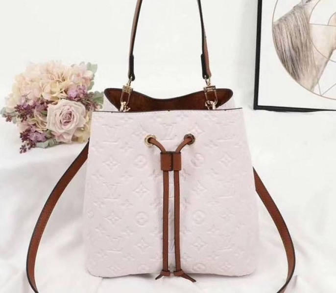 Louis Vuitton Monogram Empreinte NeoNoe MM Bag In Cream