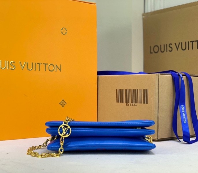 Louis Vuitton Coussin Pochette In Blue And Red angle 5