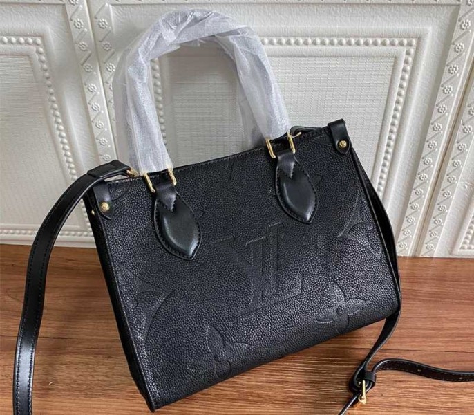 Louis Vuitton Monogram Empreinte Leather Onthego PM Bag In Black angle 2