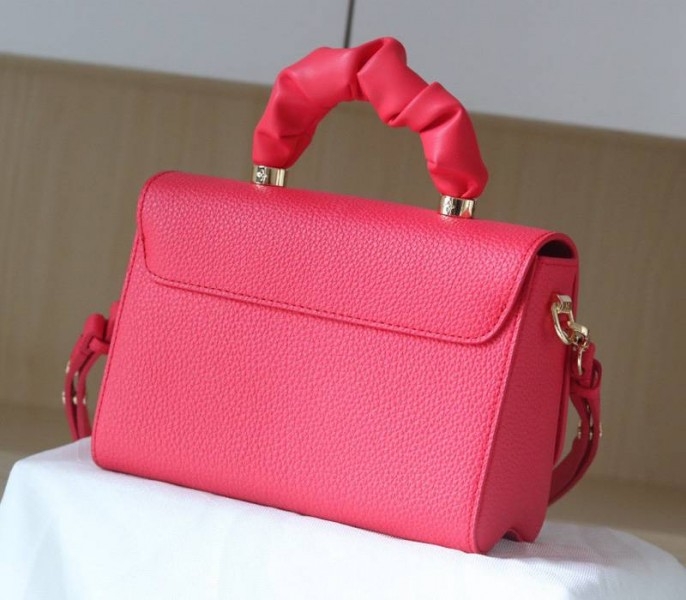 Louis Vuitton Taurillon Leather Twist MM Scrunchie Handle In Pondichery Pink angle 2