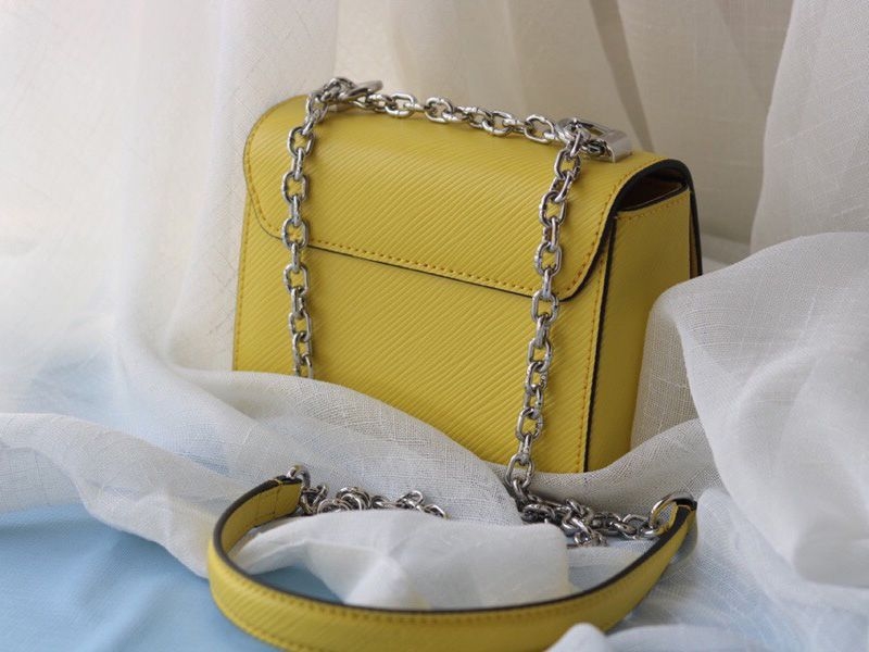 Louis Vuitton Epi Leather Twist Mini Bag In Yellow angle 3