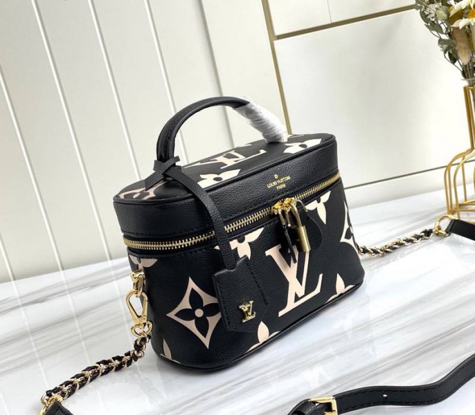 Louis Vuitton Bicolor Monogram Empreinte Vanity PM Bag In Black And Beige angle 2