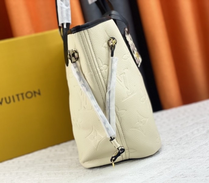 Louis Vuitton Monogram Empreinte Wild At Heart Neverfull MM Tote In Cream angle 3