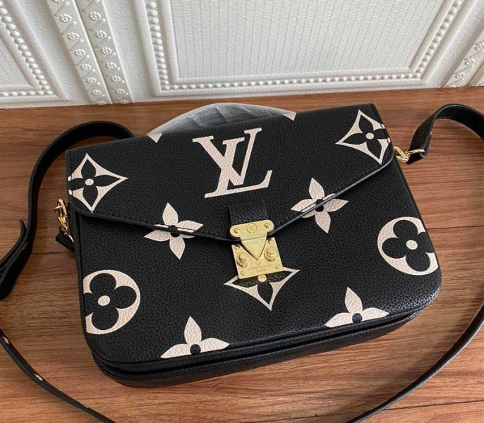Louis Vuitton Bicolor Monogram Empreinte Metis Bag In Black And Beige angle 2
