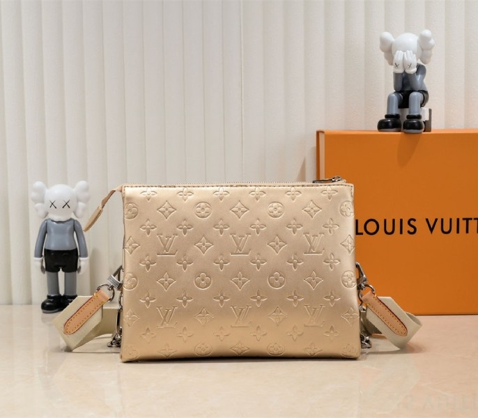 Louis Vuitton Coussin PM Bag In Light Gold With Jacquard Strap angle 2