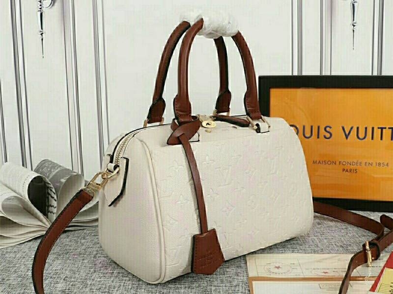 Louis Vuitton Monogram Empreinte Speedy Bandouliere 25 Handbag In Cream angle 2