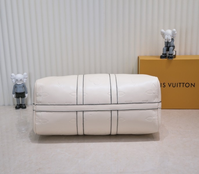 LV Monogram Empreinte Keepall Bandouliere 45 In Cream angle 3