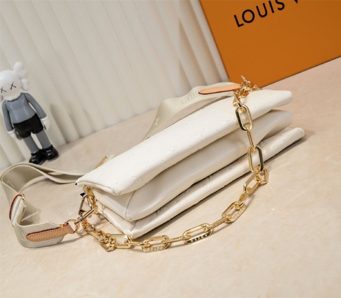 Louis Vuitton Coussin PM Bag In Cream With Jacquard Strap angle 4