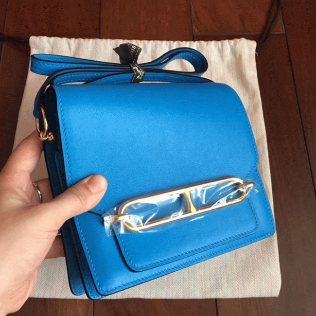 Blue hydra luxury replica Hermes Mini Sac Roulis handbag angle 4