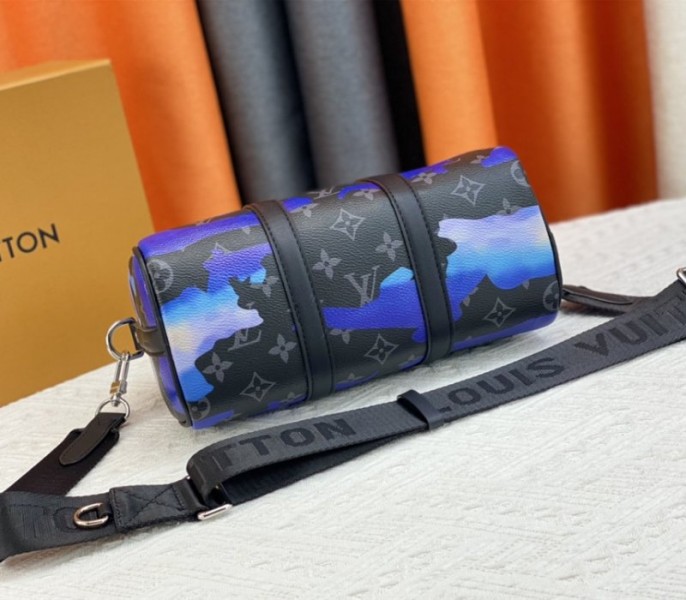 Louis Vuitton Monogram Eclipse Keepall Bandouliere 25 Travel Bag In Blue And Purple Sunrise angle 4