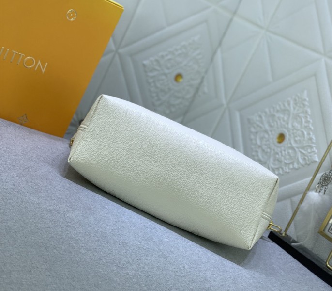 Louis Vuitton Monogram Empreinte Leather Bundle Bag In Cream angle 4