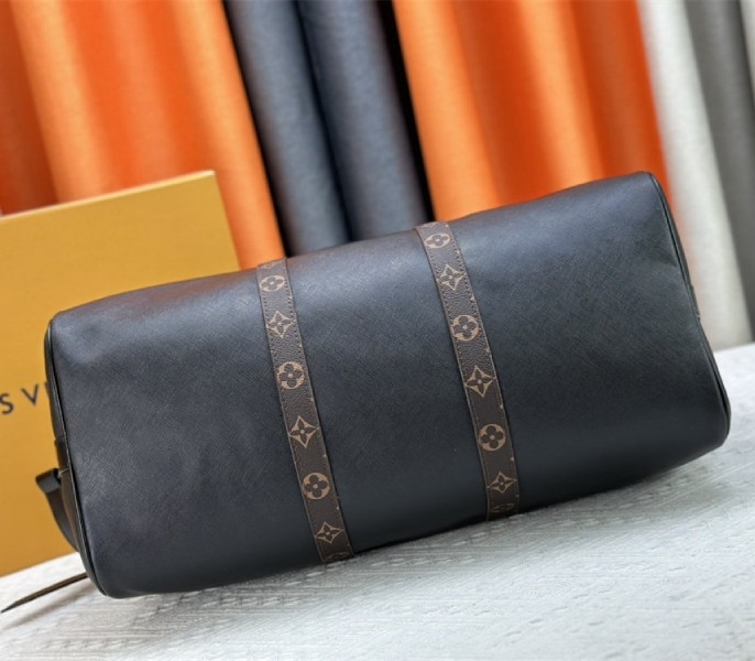 Louis Vuitton Taiga Leather Keepall Bandouliere 45 In Black And Monogram Macassar Canvas angle 5
