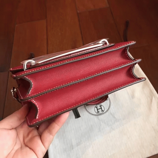 Red designer replica Hermes Mini Sac Roulis handbag angle 2