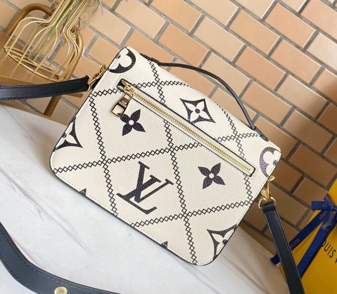Louis Vuitton Spring 2022 Monogram Empreinte Pochette Metis Handbag In Cream angle 2