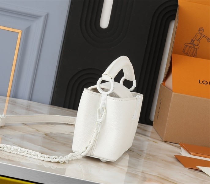 Louis Vuitton Capucines East-West Mini Handbag In Optic White angle 3