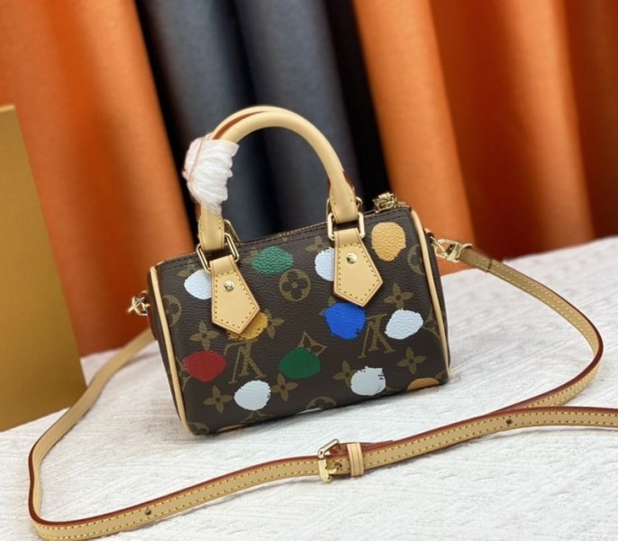 Louis Vuitton X YK Monogram Canvas Speedy Bandouliere 25 Handbag angle 3