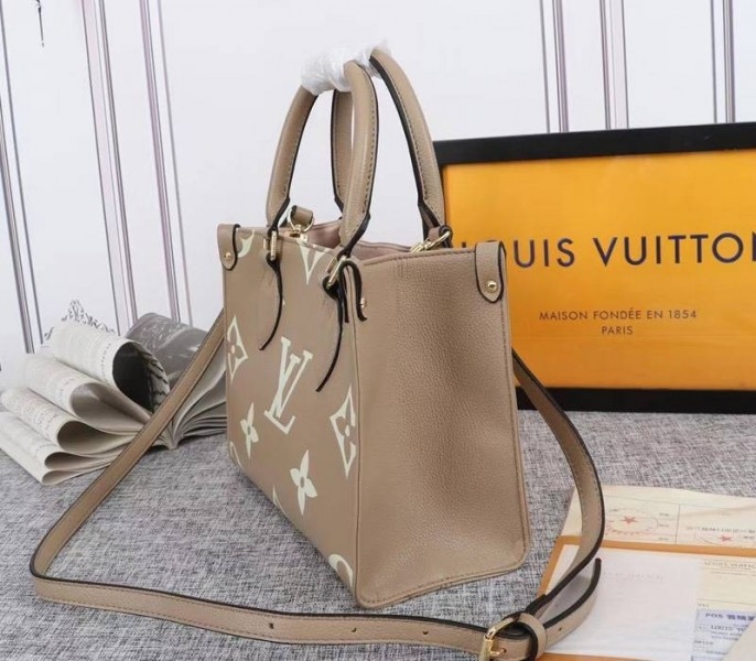 Louis Vuitton Bicolor Monogram Empreinte Leather Onthego PM Bag In Tourterelle Gray And Cream angle 3