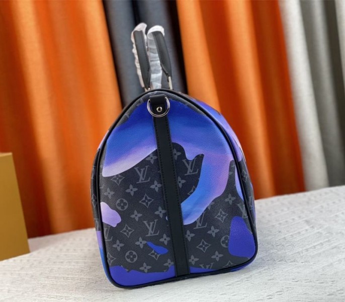 Louis Vuitton Monogram Eclipse Keepall 55 Bandouliere Travel Bag In Blue Sunrise angle 4