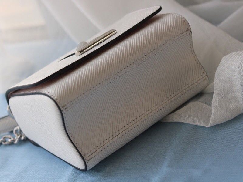 Louis Vuitton Epi Leather Twist Mini Bag In Off-White angle 4