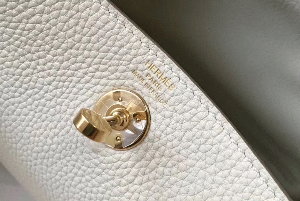 Replica Hermes Lindy Mini handbag in white clemence leather angle 3