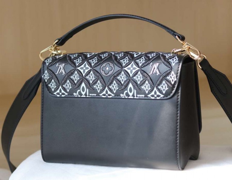 Louis Vuitton Since 1854 Twist MM Bag angle 4