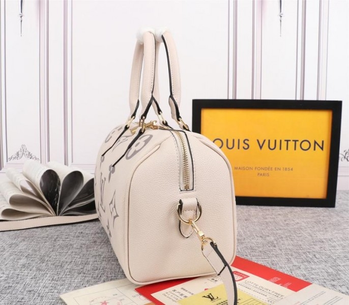 Louis Vuitton Bicolor Monogram Empreinte Leather Speedy Bandouliere 25 Handbag In Cream And Bois De Rose Pink angle 3