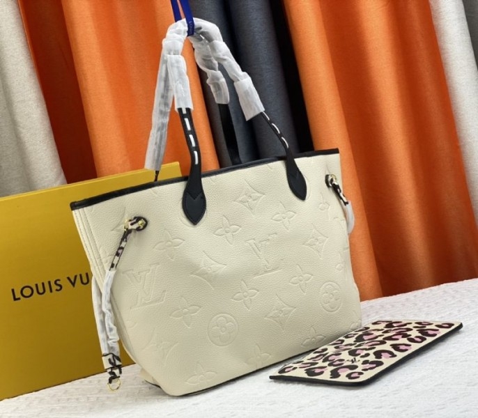 Louis Vuitton Monogram Empreinte Wild At Heart Neverfull MM Tote In Cream angle 2