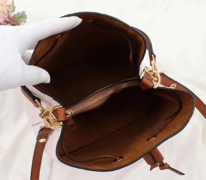 Louis Vuitton Monogram Empreinte NeoNoe MM Bag In Cream angle 5