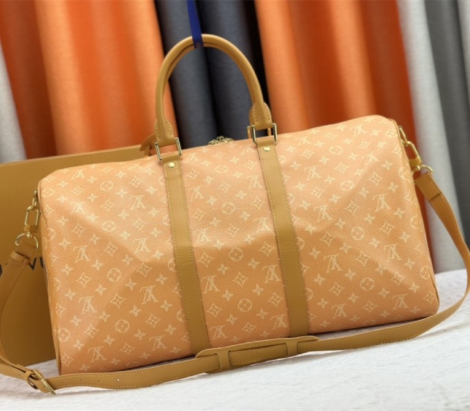 Louis Vuitton Monogram Heritage Canvas Keepall Bandouliere 50 In Yellow angle 3