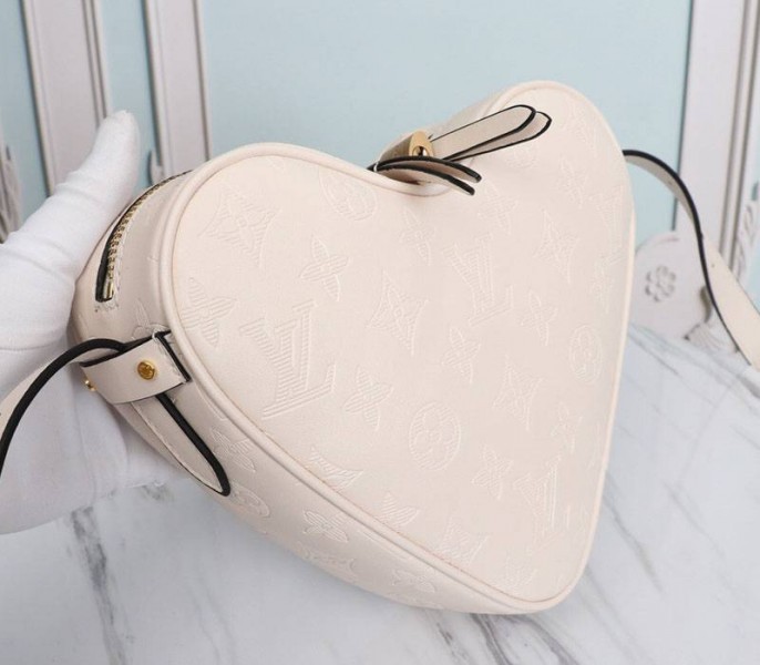 Louis Vuitton Monogram Empreinte Game On Coeur Bag In Cream angle 2