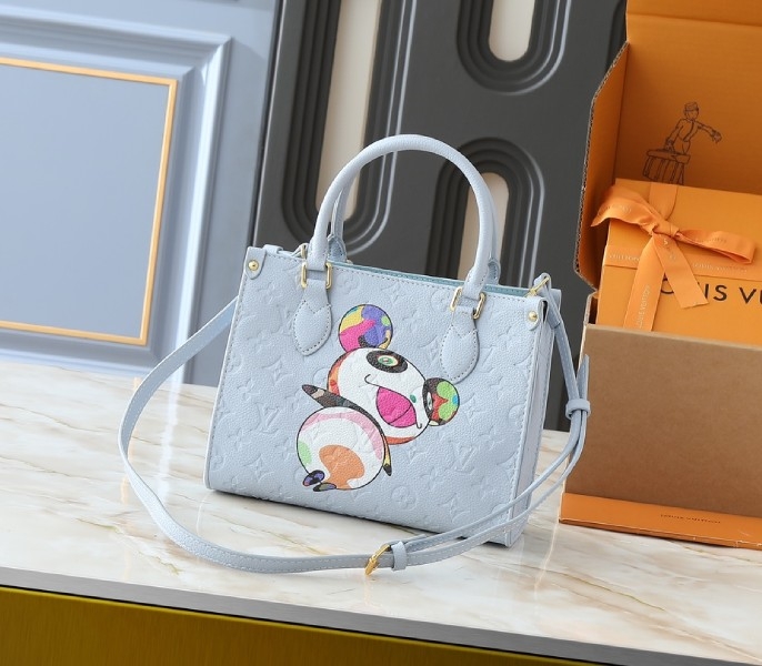 LV X TM Monogram Empreinte OnTheGo PM With Bijou Edition In Washed Blue angle 3