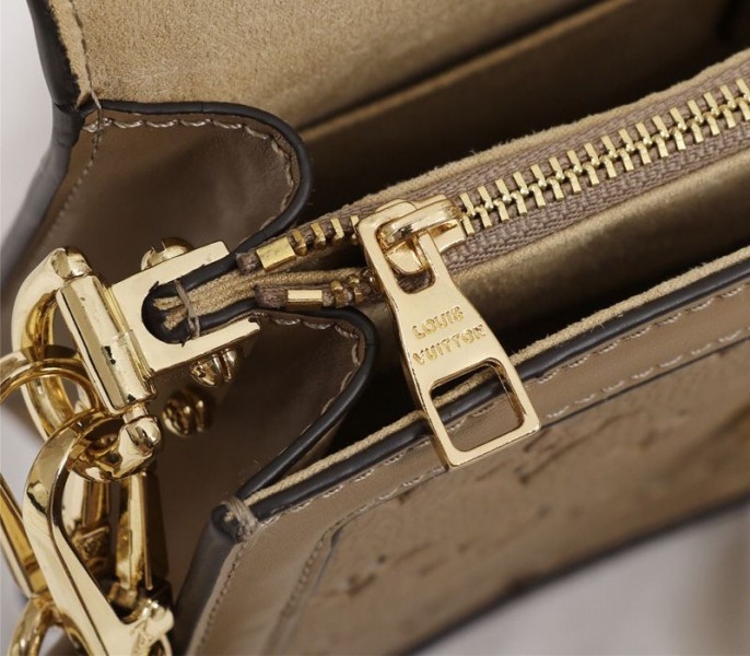 Louis Vuitton Monogram Empreinte Dauphine Bag In Brown angle 4