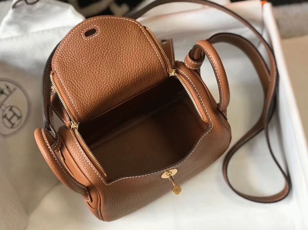 Top replica Hermes Lindy Mini handbag in gold angle 2