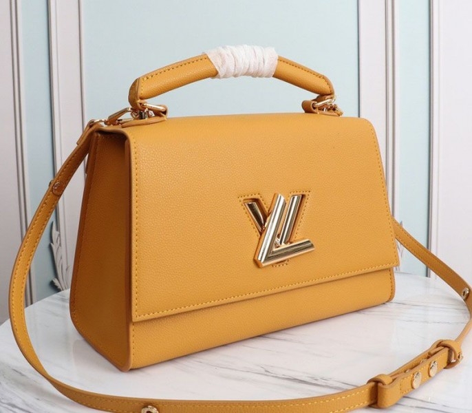 Louis Vuitton Twist One Handle MM Handbag In Vibrant Honey angle 2