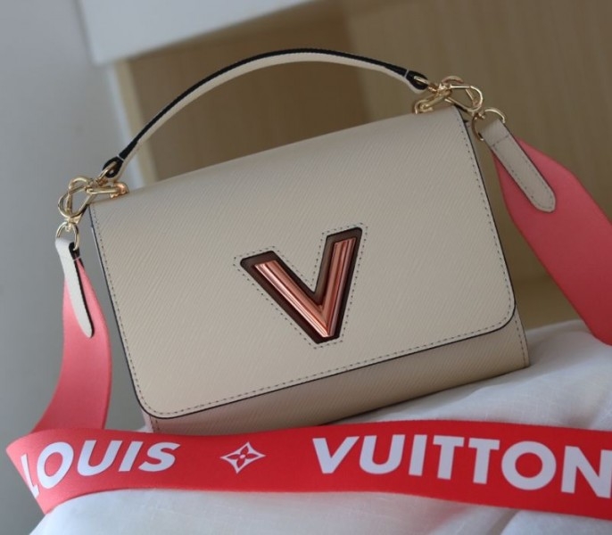 Louis Vuitton Epi Leather Twist MM Handbag In Quartz White With Gradient Strap angle 3