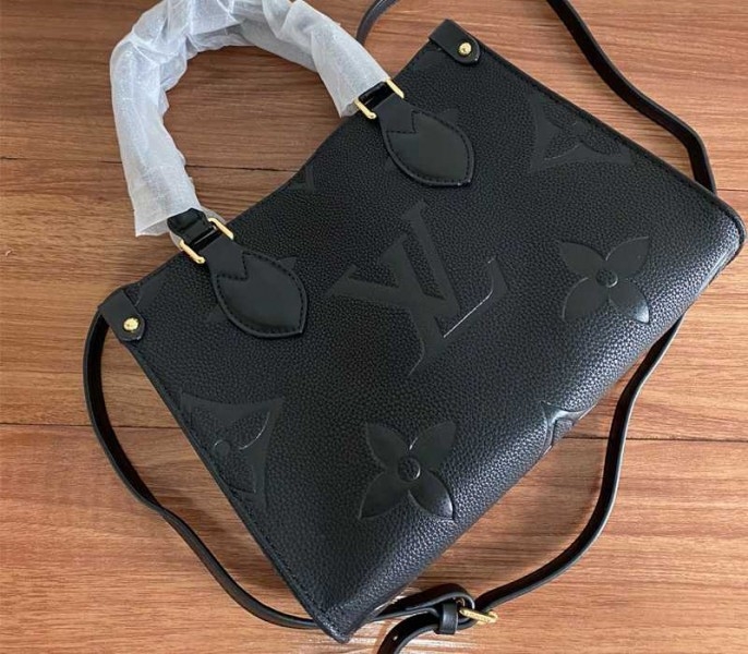 Louis Vuitton Monogram Empreinte Leather Onthego PM Bag In Black angle 3