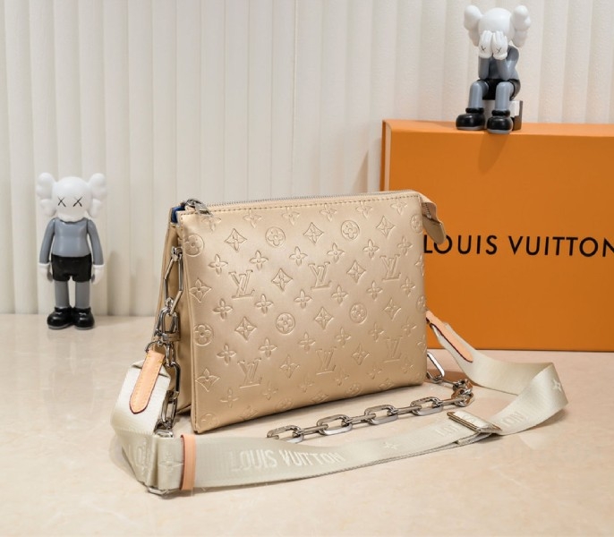 Louis Vuitton Coussin PM Bag In Light Gold With Jacquard Strap angle 3