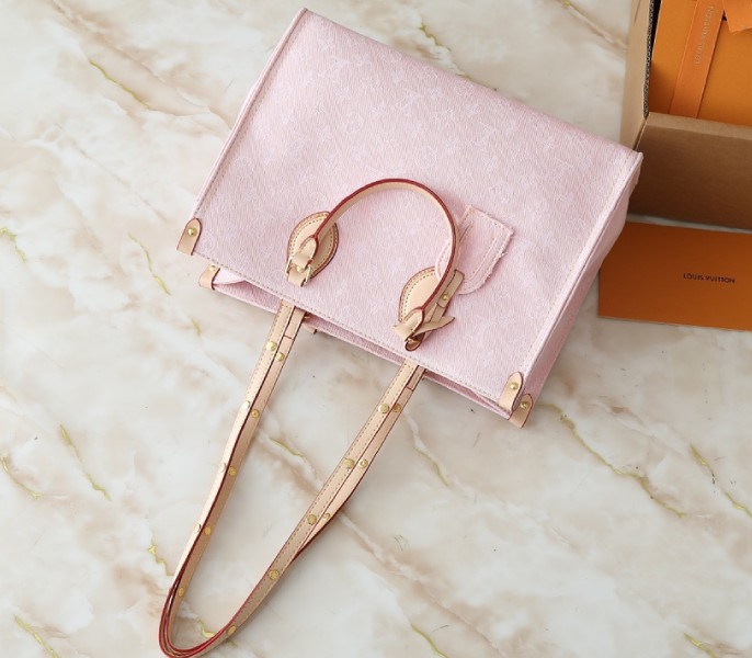 Monogram Denim OnTheGo MM In Washed Pink angle 2