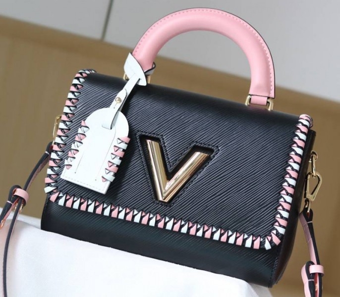 Louis Vuitton Epi Leather Twist MM Bag In Black With Braided Edges Flap angle 3