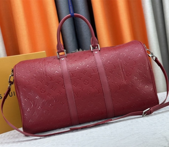 Louis Vuitton Taurillon Leather Keepall Bandouliere 50 In Sari Red angle 3